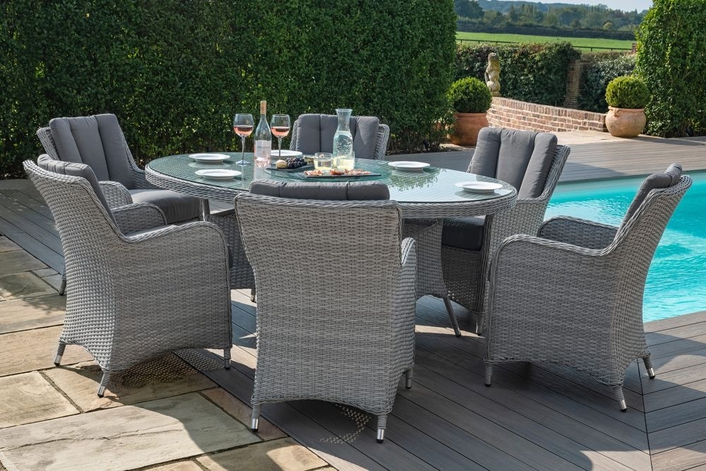 Product photograph of Maze Ascot 6 Seat Oval Rattan Dining Set With Lazy Susan And Weatherproof Cushions from Choice Furniture Superstore.