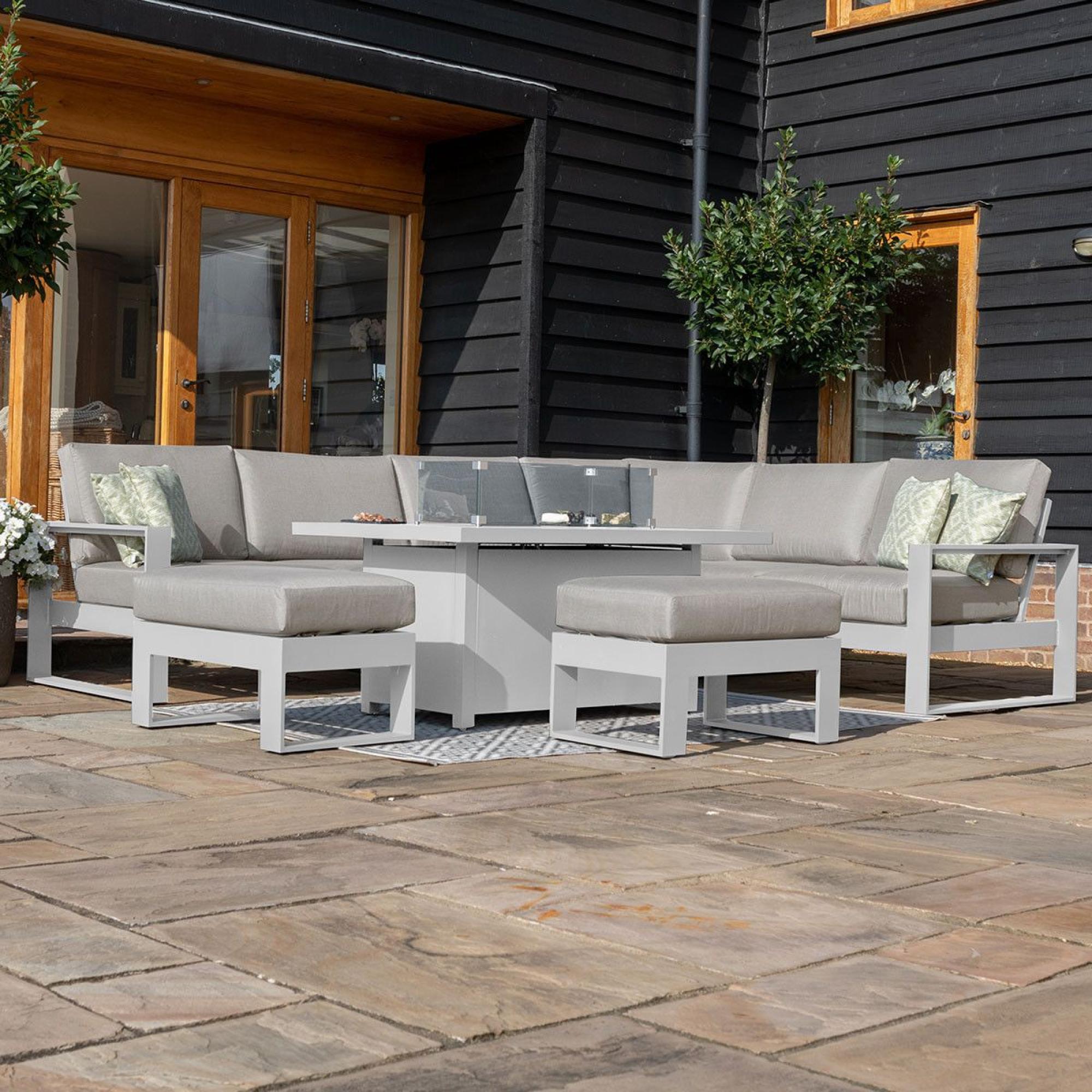 Product photograph of Maze Amalfi White Large Corner Dining Set With Fire Pit Table And Footstools from Choice Furniture Superstore.