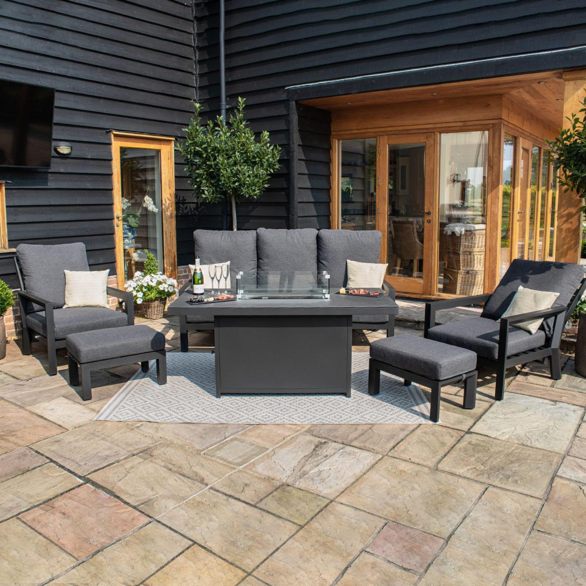 Product photograph of Maze Manhattan Reclining 3 Seat Sofa Set With Fire Pit Table And Footstools from Choice Furniture Superstore.