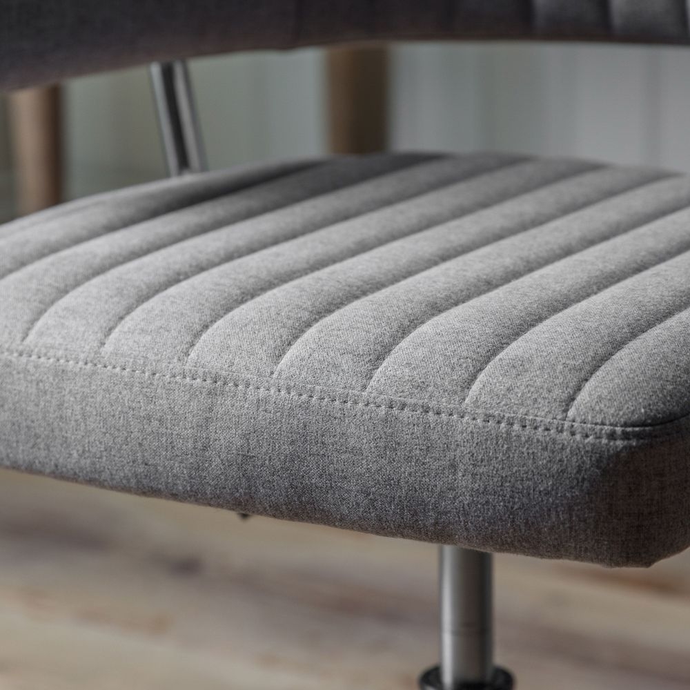 Product photograph of Mcintyre Grey Fabric Swivel Chair from Choice Furniture Superstore.