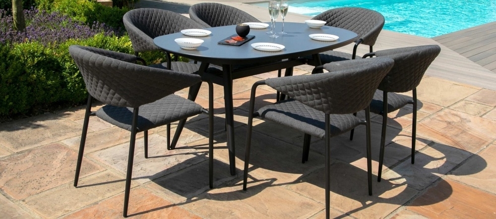 Product photograph of Maze Lounge Outdoor Pebble Fabric 6 Seat Oval Dining Set from Choice Furniture Superstore.