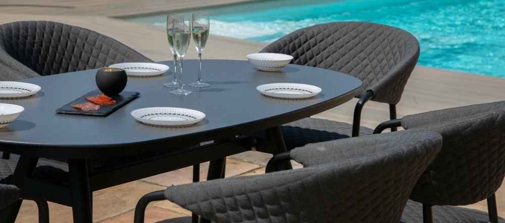 Product photograph of Maze Lounge Outdoor Pebble Fabric 6 Seat Oval Dining Set from Choice Furniture Superstore.