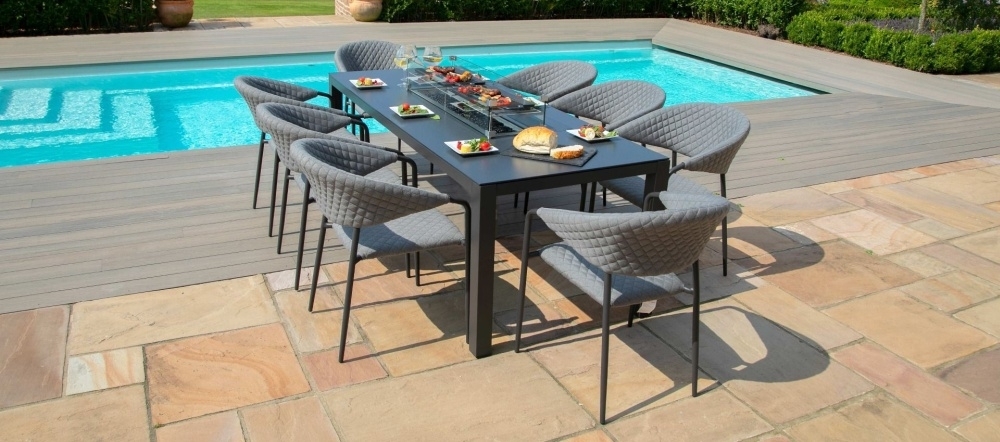 Product photograph of Maze Lounge Outdoor Pebble Flanelle Fabric 8 Seat Rectangular Dining Set With Fire Pit Table from Choice Furniture Superstore.