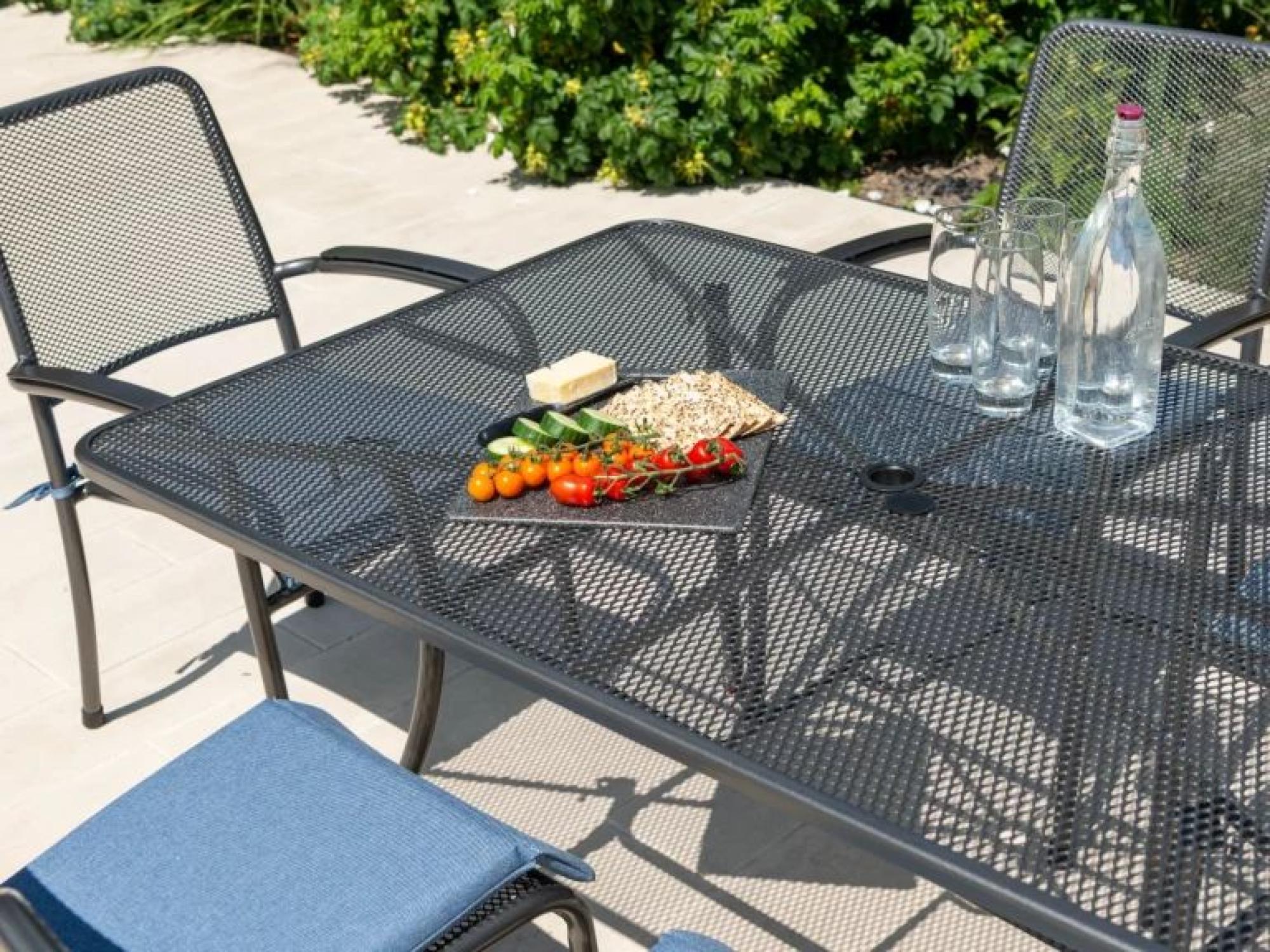 Product photograph of Alexander Rose Portofino 145cm Dining Table from Choice Furniture Superstore.