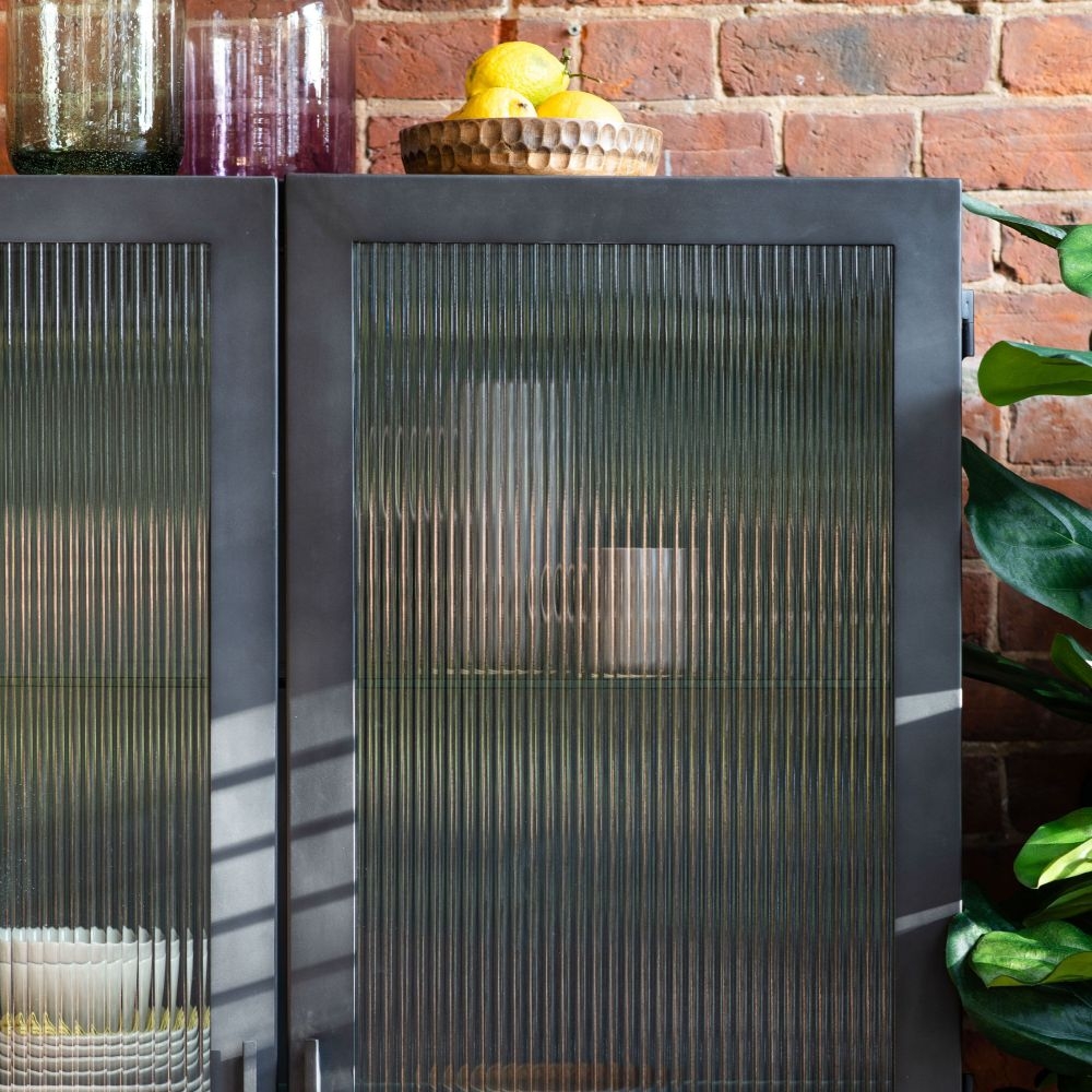 Product photograph of Rye Grey Metal And Reeded Glass 2 Door 2 Drawer Display Unit from Choice Furniture Superstore.