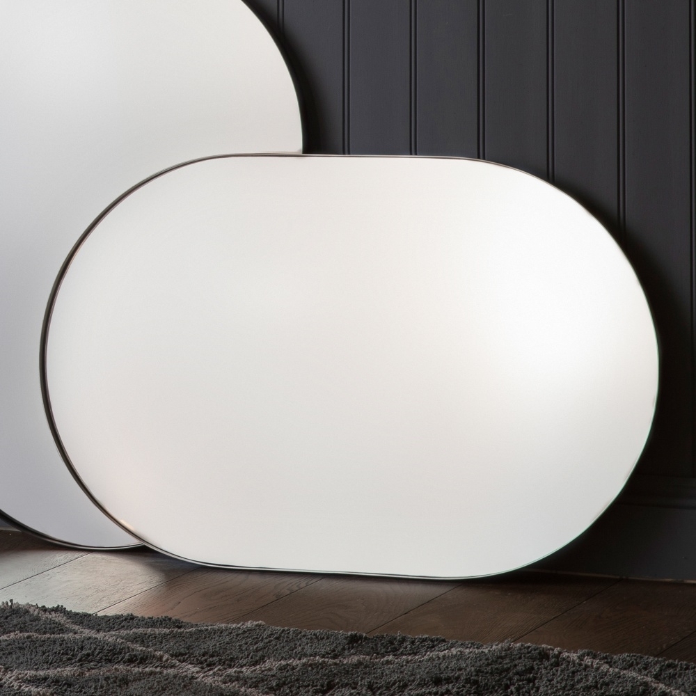 Product photograph of Hurston Champagne Elipse Mirror from Choice Furniture Superstore.