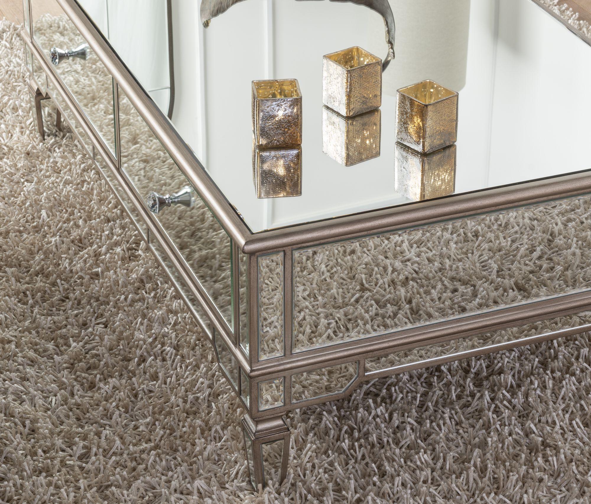 Product photograph of Antoinette Mirrored Champagne Trim Coffee Table from Choice Furniture Superstore.