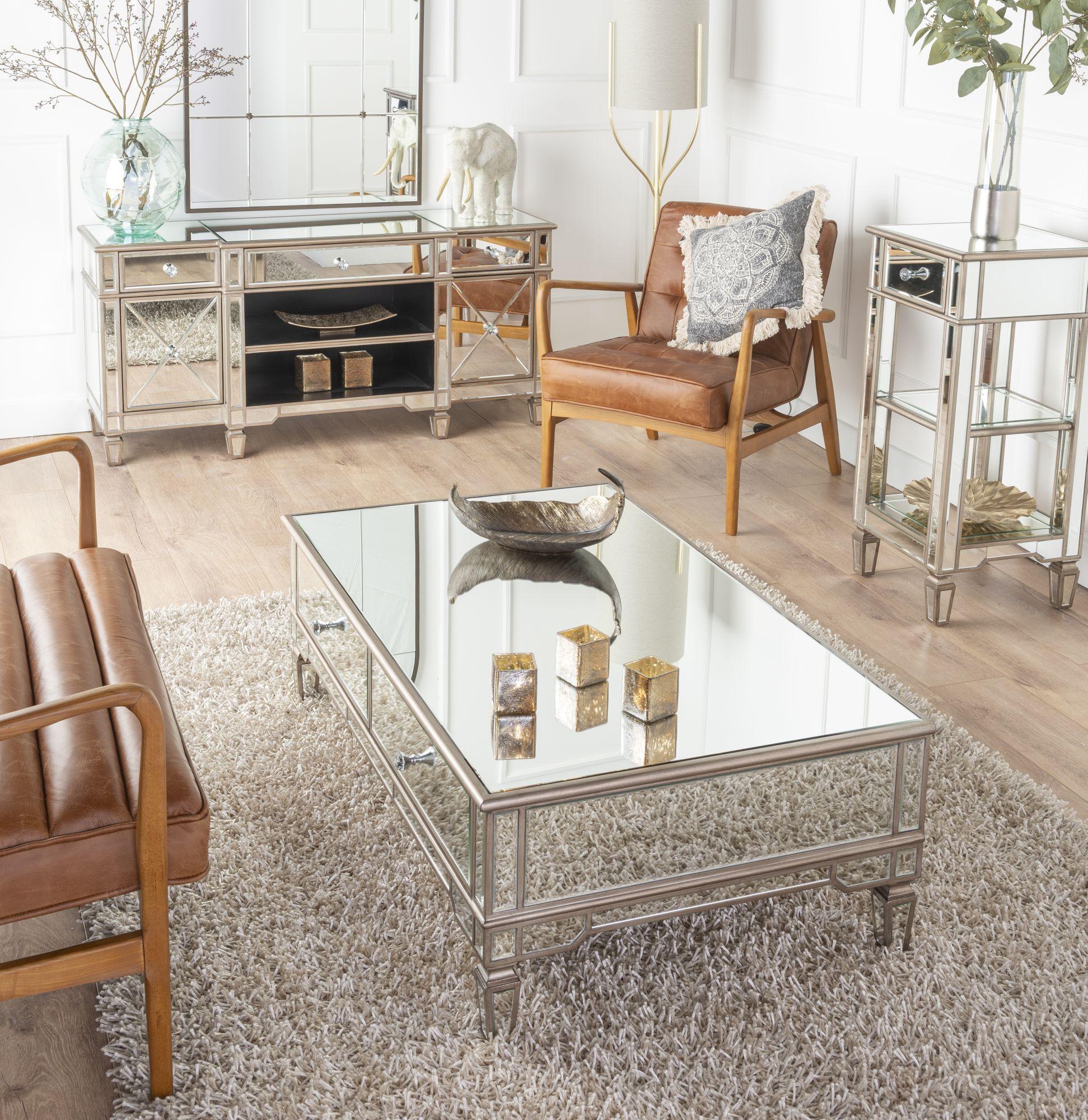 Product photograph of Antoinette Mirrored Champagne Trim Coffee Table from Choice Furniture Superstore.