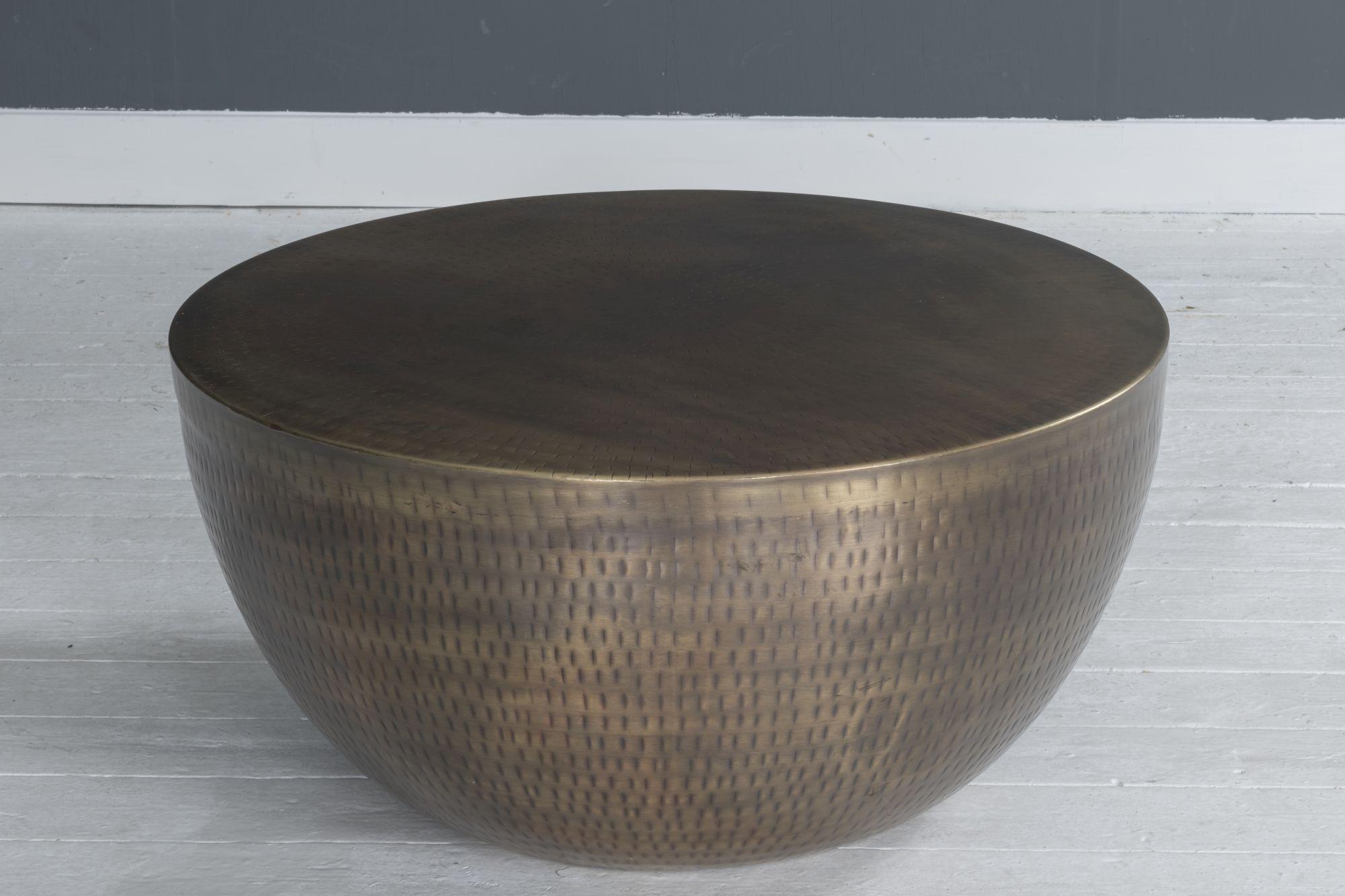 Product photograph of Agra Hammered Antique Brass Coffee Table - Metal Round Base from Choice Furniture Superstore.