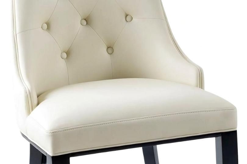 Product photograph of Carmela Cream Dining Chair Leather - Faux Pu Tufted Scoop Back With Black Wooden Legs from Choice Furniture Superstore.