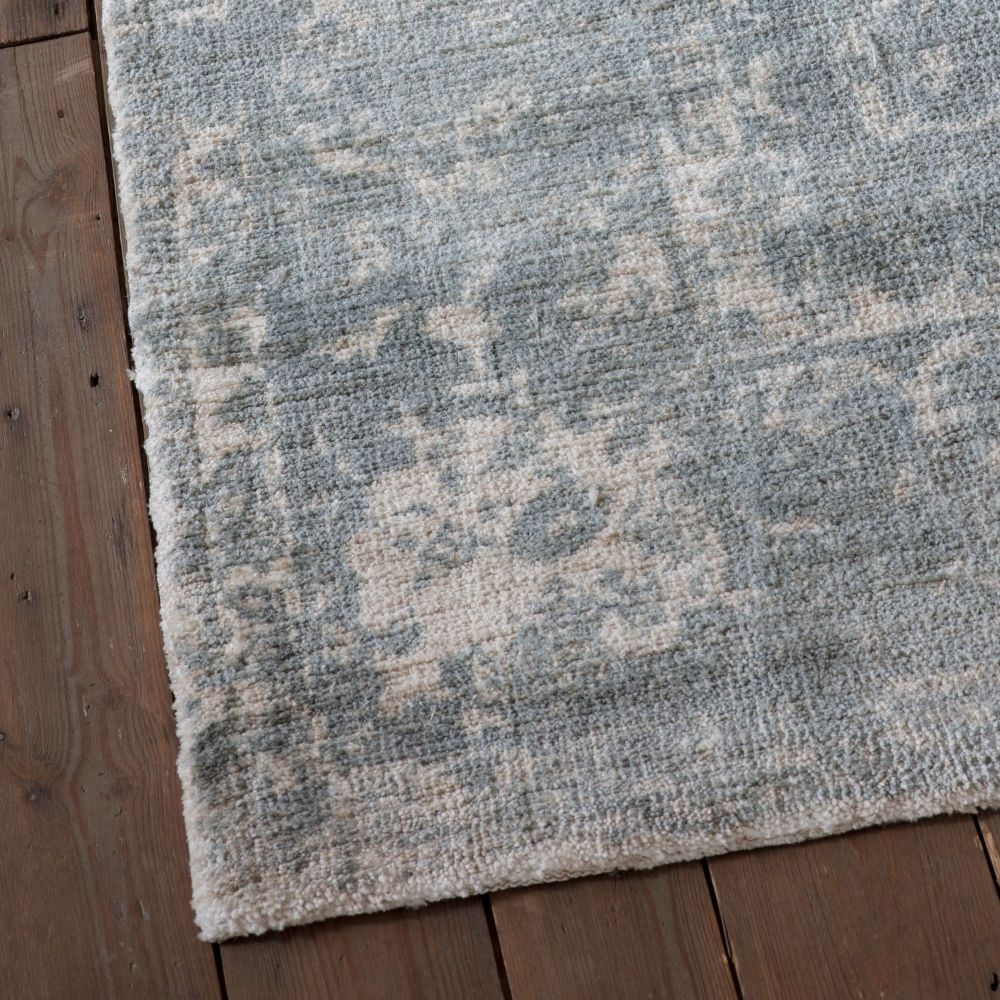 Product photograph of Minott Ornate Faded Dark Teal Rug - 230cm X 160cm from Choice Furniture Superstore.
