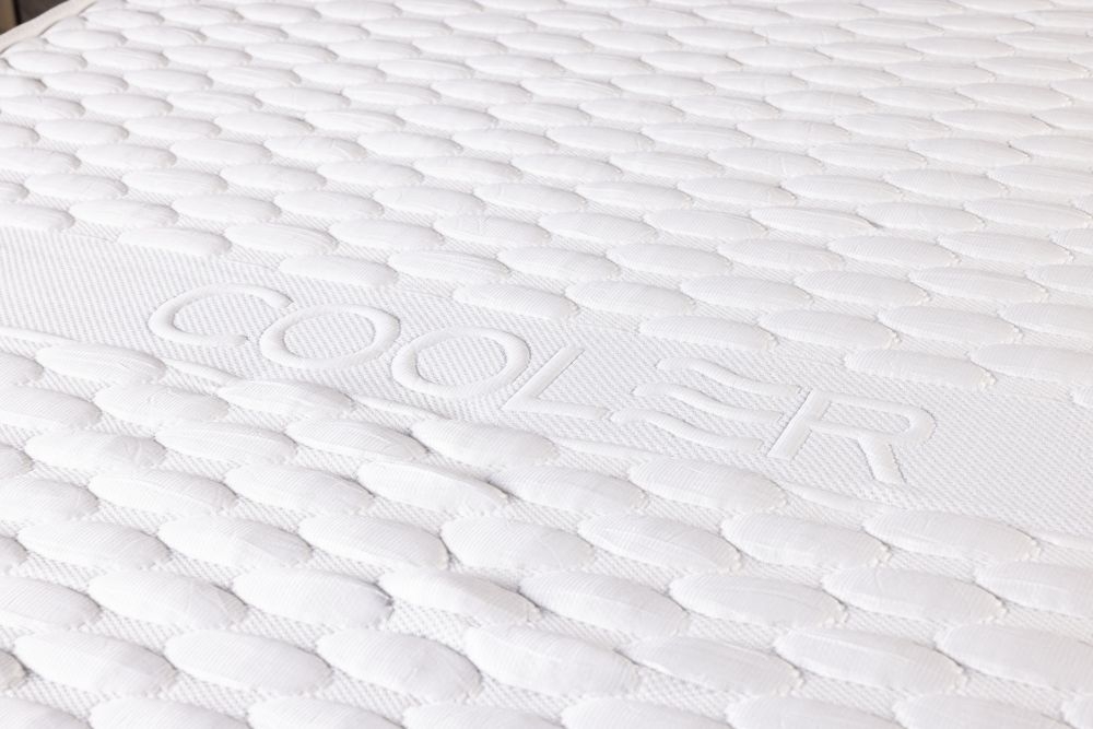 Product photograph of Urban Deco Kemer Coolhot Quilted 28cm Deep Pocket Sprung Mattress - 4ft 6in Double from Choice Furniture Superstore.