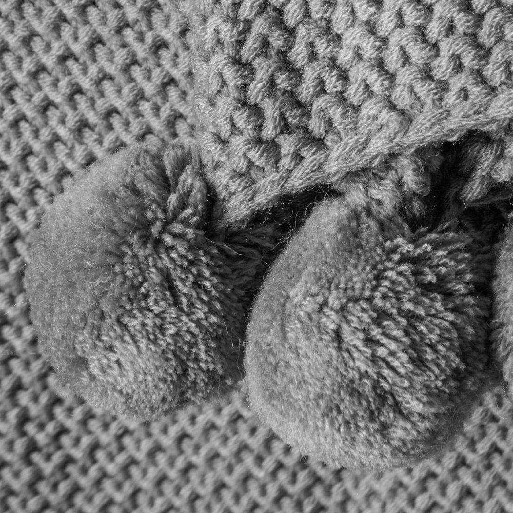 Product photograph of Moss Stitched Knitted Pom Pom Grey Fabric Throw from Choice Furniture Superstore.