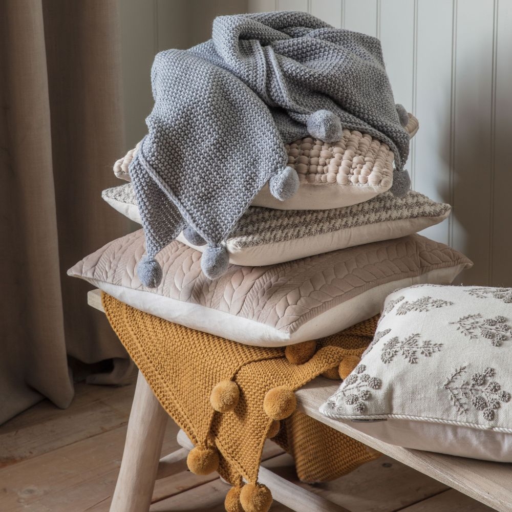 Product photograph of Moss Stitched Knitted Pom Pom Grey Fabric Throw from Choice Furniture Superstore.