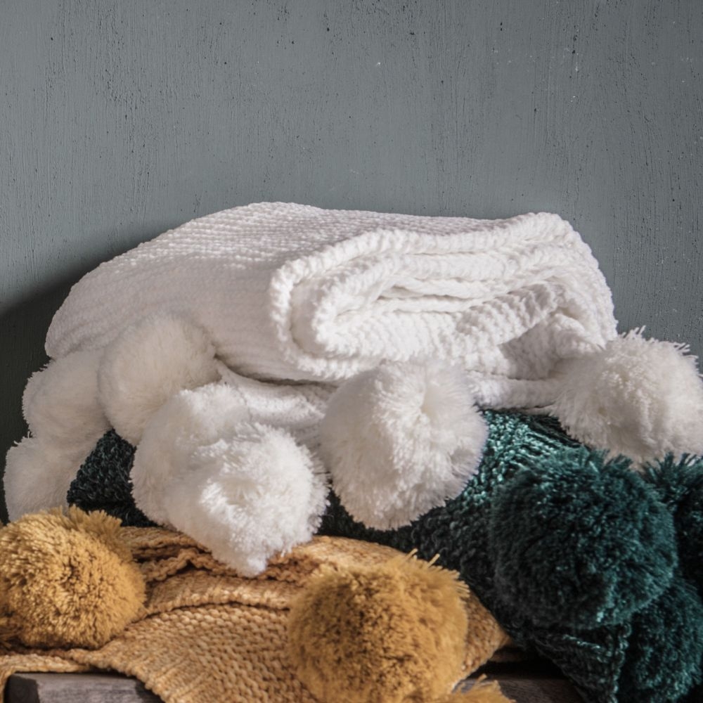 Product photograph of Knitted Pom Pom Chenille Cream Fabric Throw from Choice Furniture Superstore.