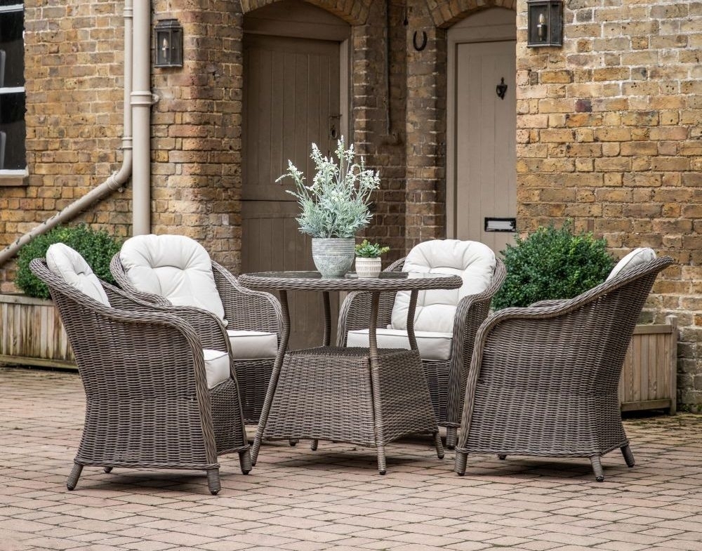 Product photograph of Morwich Rattan 4 Seater Round Outdoor Garden Dining Set from Choice Furniture Superstore.