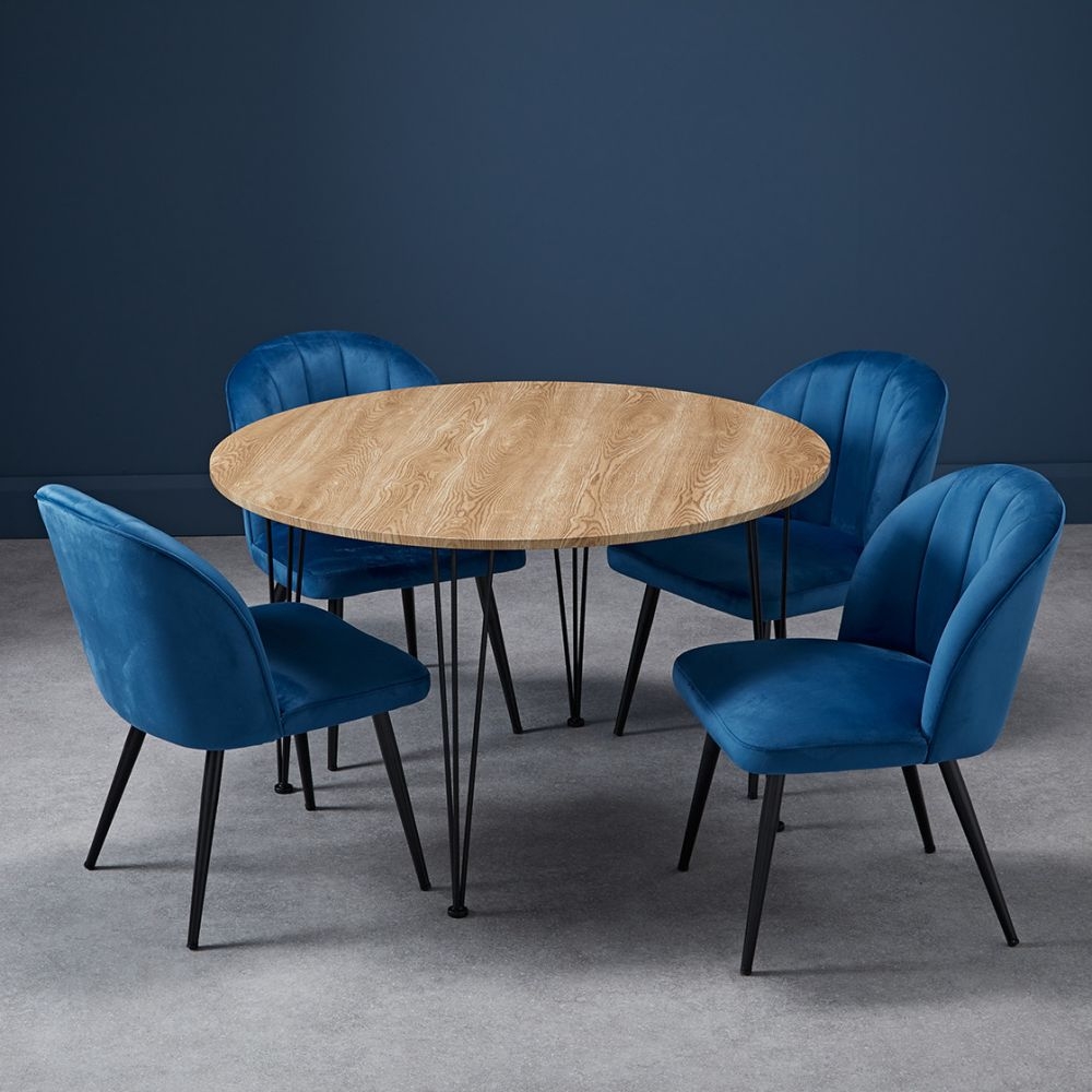 Product photograph of Orla Blue Velvet Fabric Dining Chair With Black Legs Sold In Pairs from Choice Furniture Superstore.