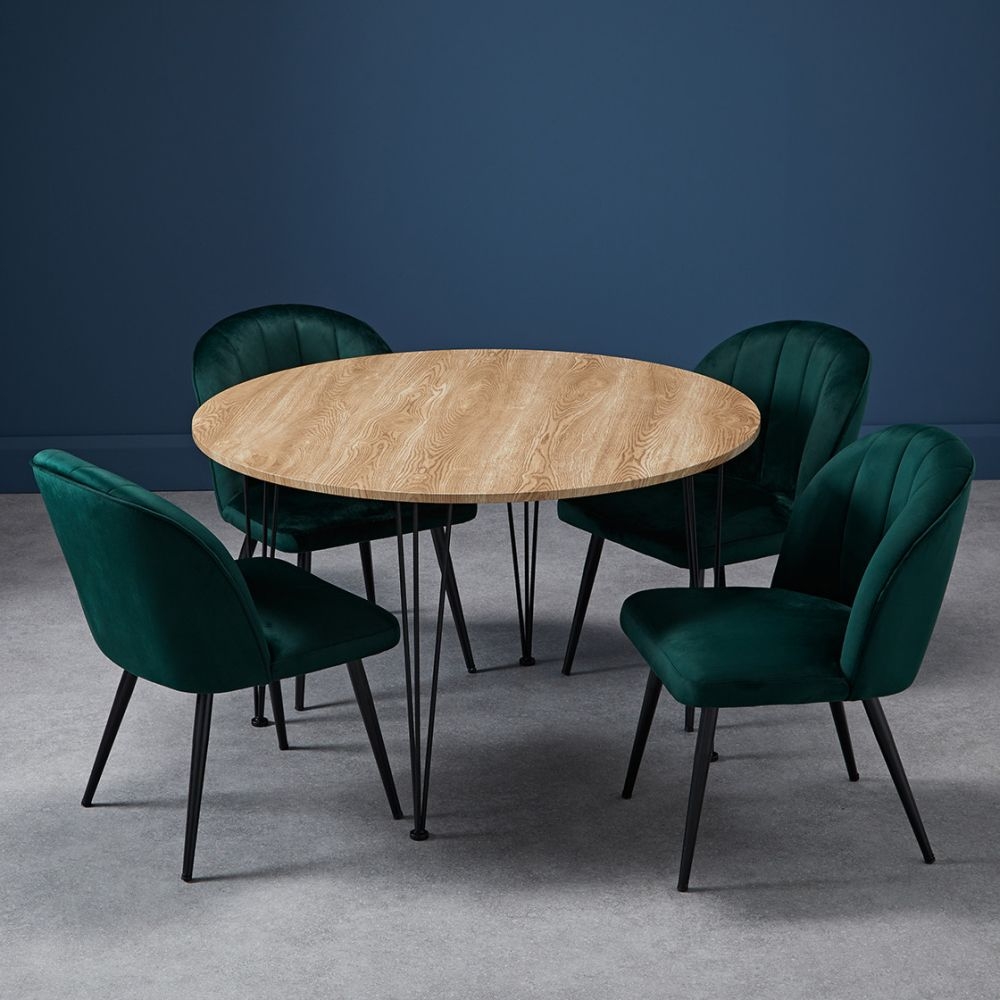 Product photograph of Orla Green Velvet Fabric Dining Chair With Black Legs Sold In Pairs from Choice Furniture Superstore.