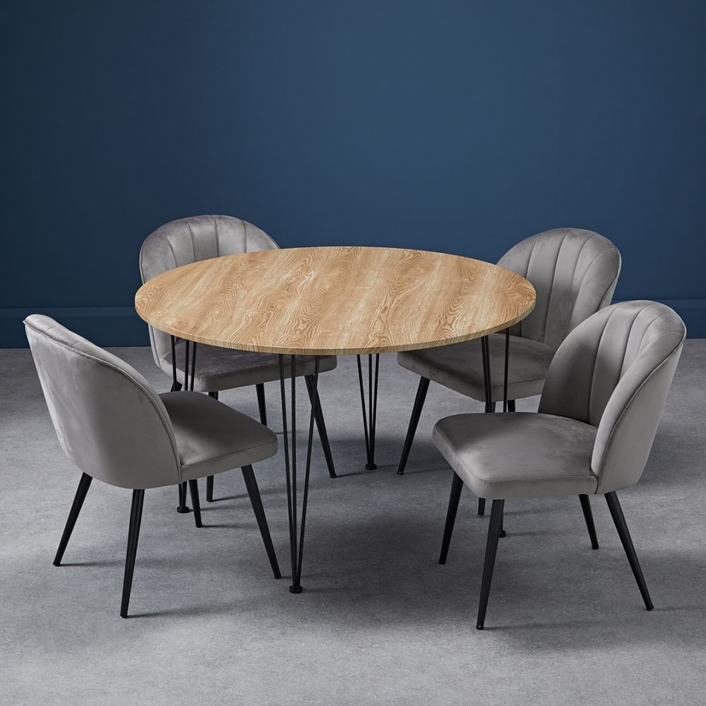 Product photograph of Orla Grey Velvet Fabric Dining Chair With Black Legs Sold In Pairs from Choice Furniture Superstore.