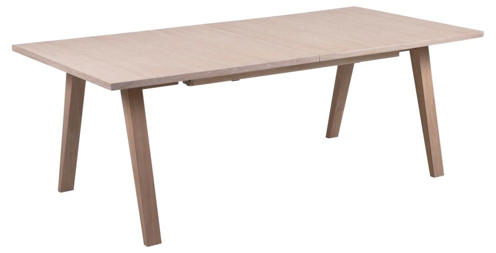 Product photograph of Anvik Oak 8-12 Seater Extending Dining Table from Choice Furniture Superstore.