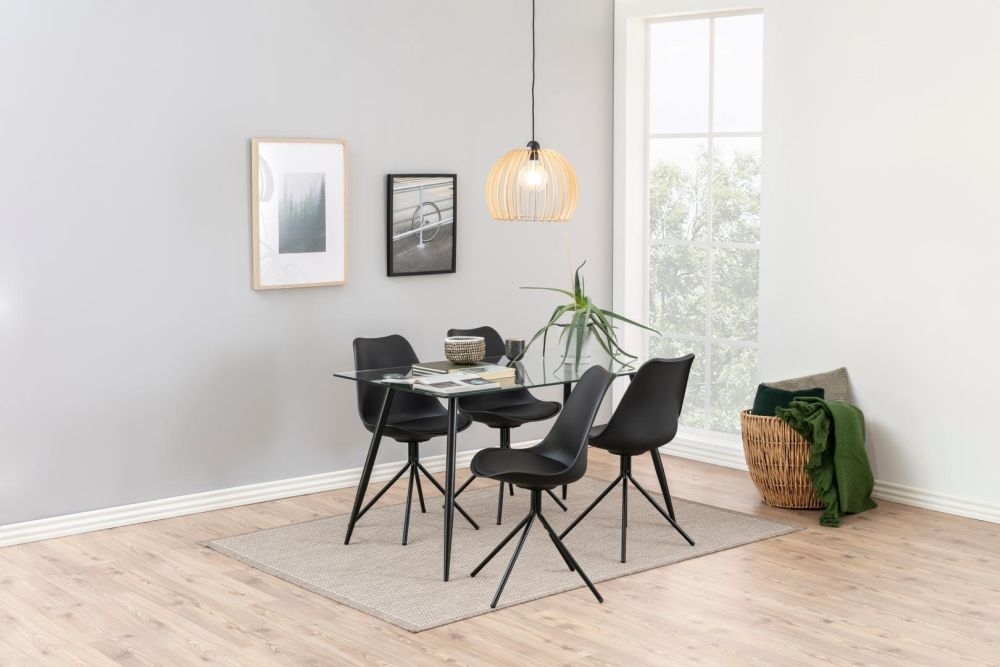 Product photograph of Welby Glass Top And Matt Black Legs 4 Seater Dining Table - 140cm from Choice Furniture Superstore.