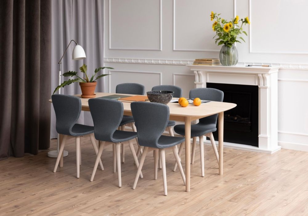 Product photograph of Arnot Oak Dining Table - 8 Seater from Choice Furniture Superstore.