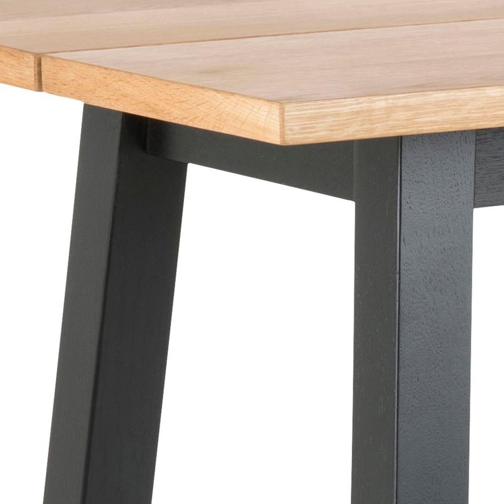 Product photograph of Cayce Oak And Black Bar Table from Choice Furniture Superstore.