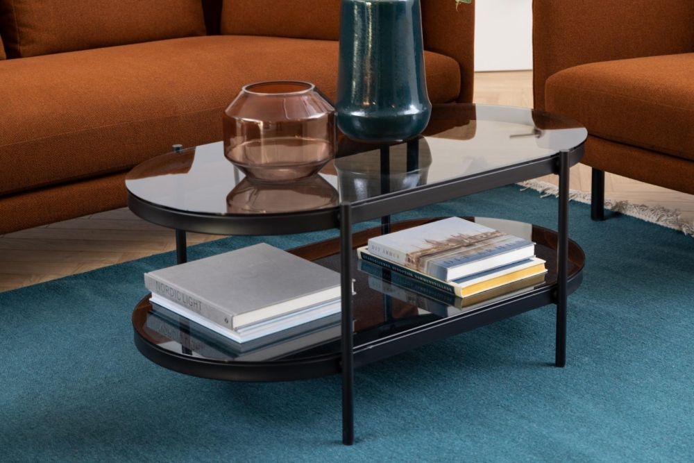 Product photograph of Briar Glass Top Oval Coffee Table from Choice Furniture Superstore.