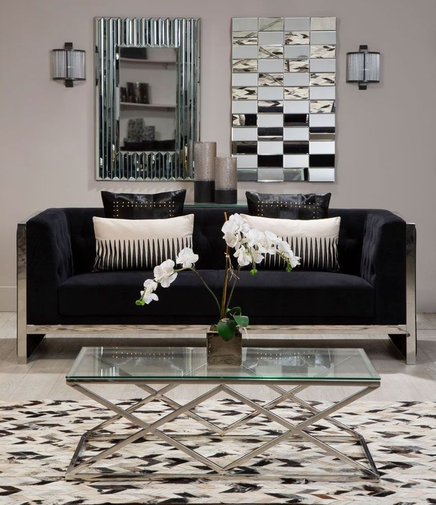 Product photograph of Kelley Glass Top And Silver Inverted Prism Base Coffee Table from Choice Furniture Superstore.