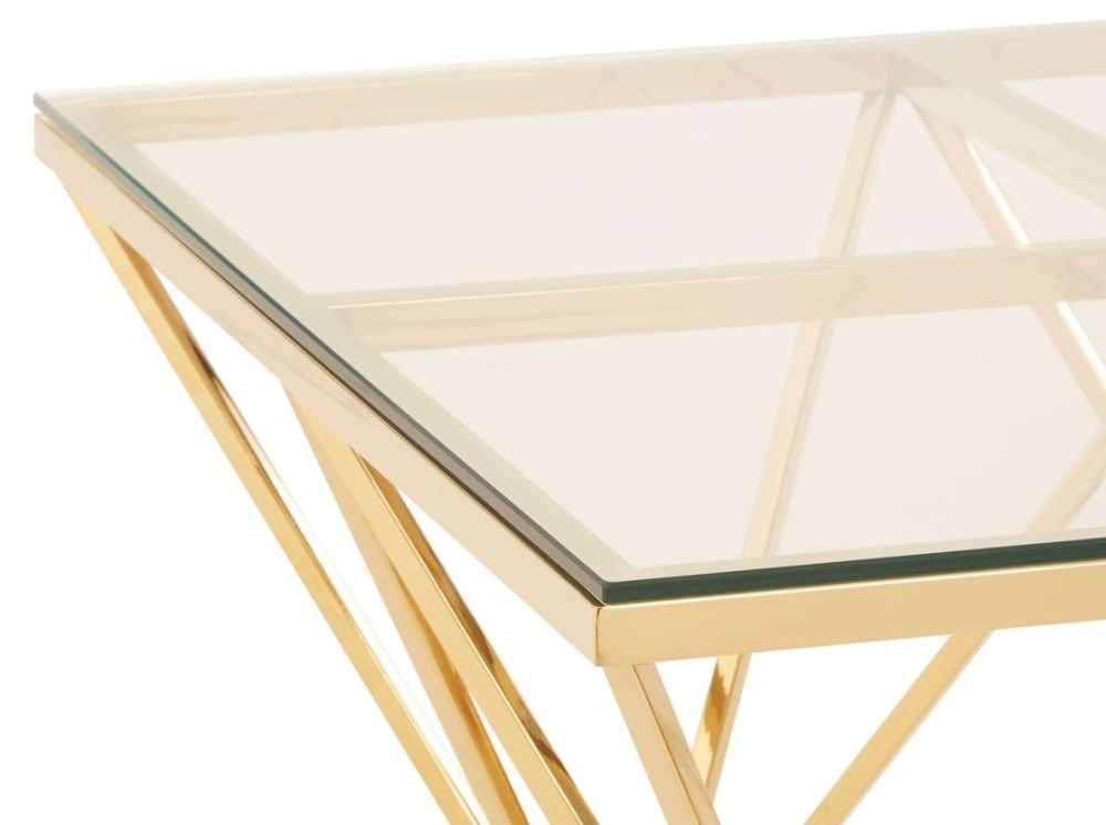 Product photograph of Kelley Glass Top And Gold Spike Triangle Base Coffee Table from Choice Furniture Superstore.