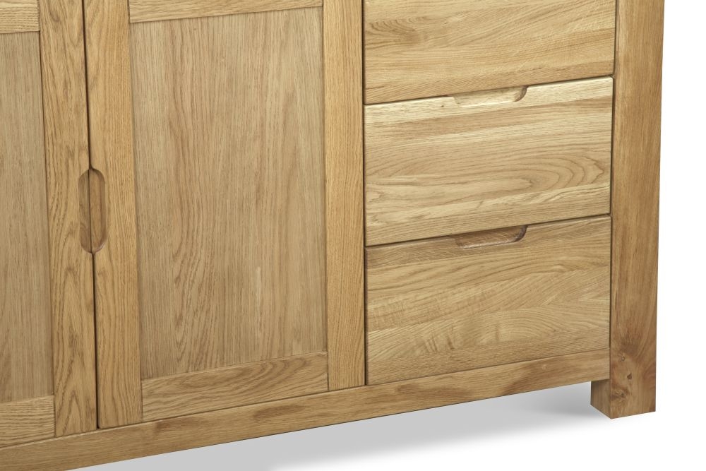 Product photograph of Brice Oak Medium Sideboard 140cm W With 2 Doors And 3 Drawers from Choice Furniture Superstore.