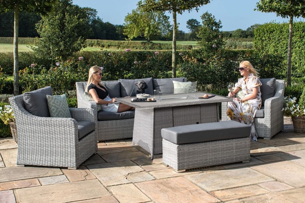 Product photograph of Maze Ascot Grey 3 Seat Rattan Sofa Dining Set With Fire Pit And Weatherproof Cushions from Choice Furniture Superstore.