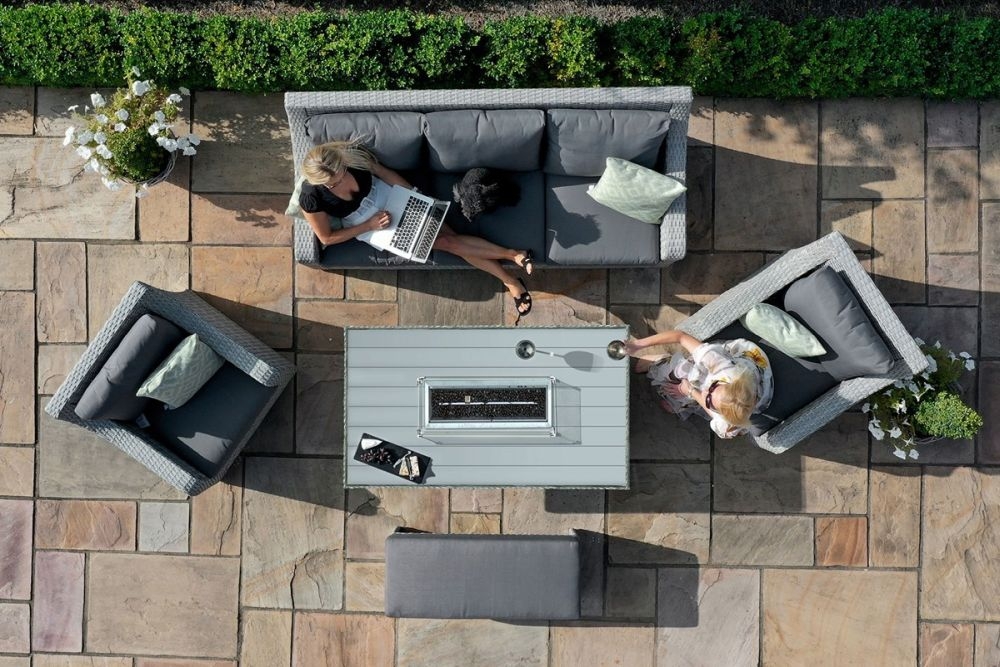 Product photograph of Maze Ascot Grey 3 Seat Rattan Sofa Dining Set With Fire Pit And Weatherproof Cushions from Choice Furniture Superstore.
