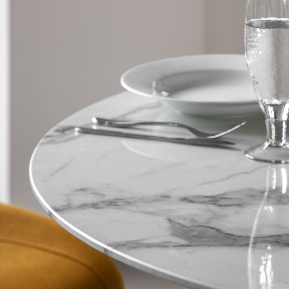 Product photograph of Connolly 110cm White Marble Effect Round Dining Table from Choice Furniture Superstore.