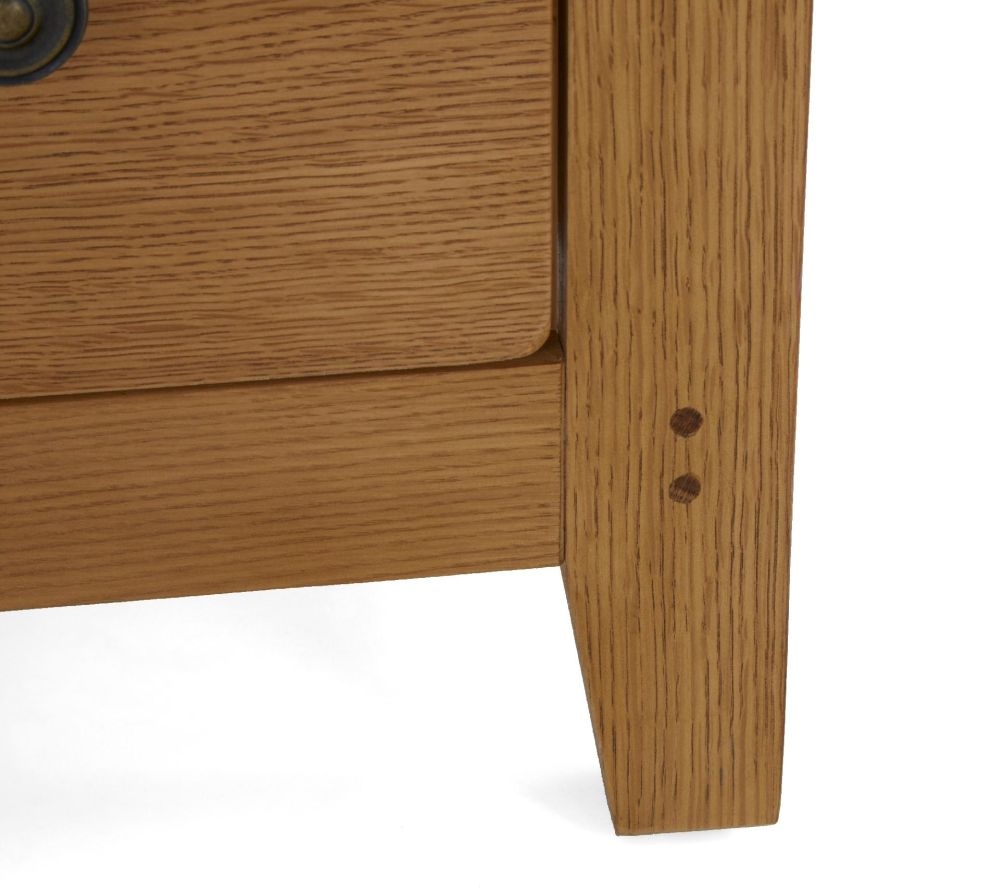 Product photograph of Burford Oak 2 Drawer Narrow Bedside Cabinet from Choice Furniture Superstore.