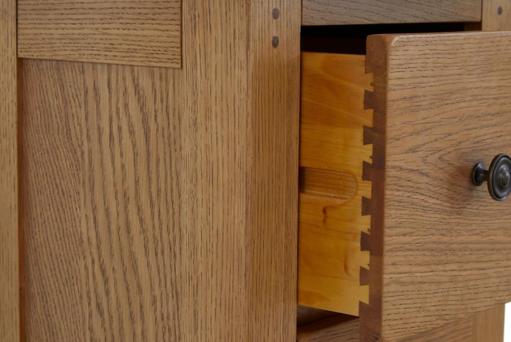 Product photograph of Burford Oak 2 Drawer Narrow Bedside Cabinet from Choice Furniture Superstore.
