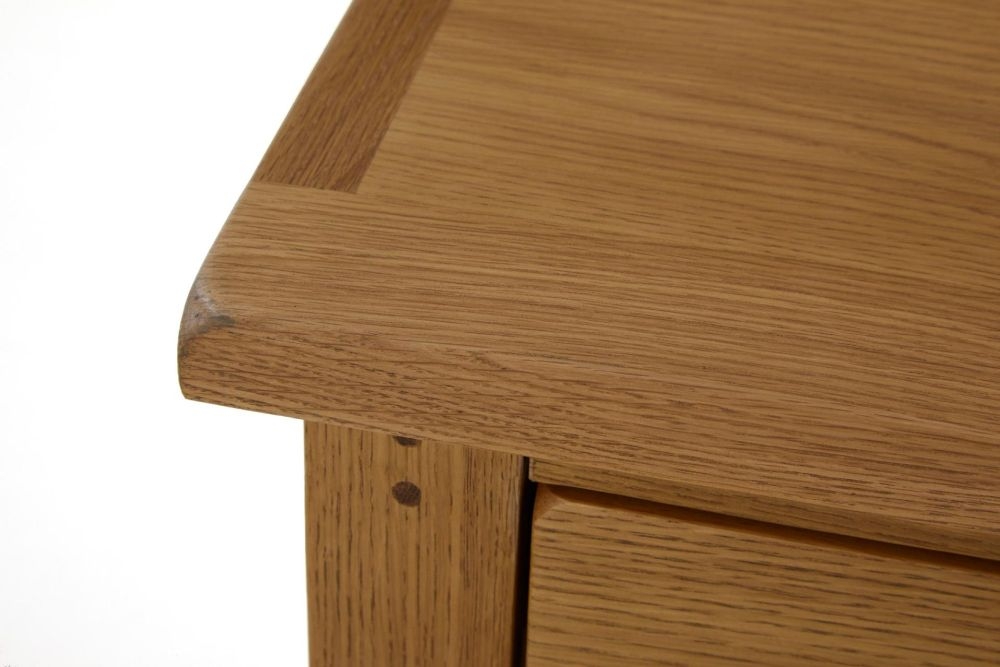 Product photograph of Burford Oak 3 Drawer Bedside Cabinet from Choice Furniture Superstore.