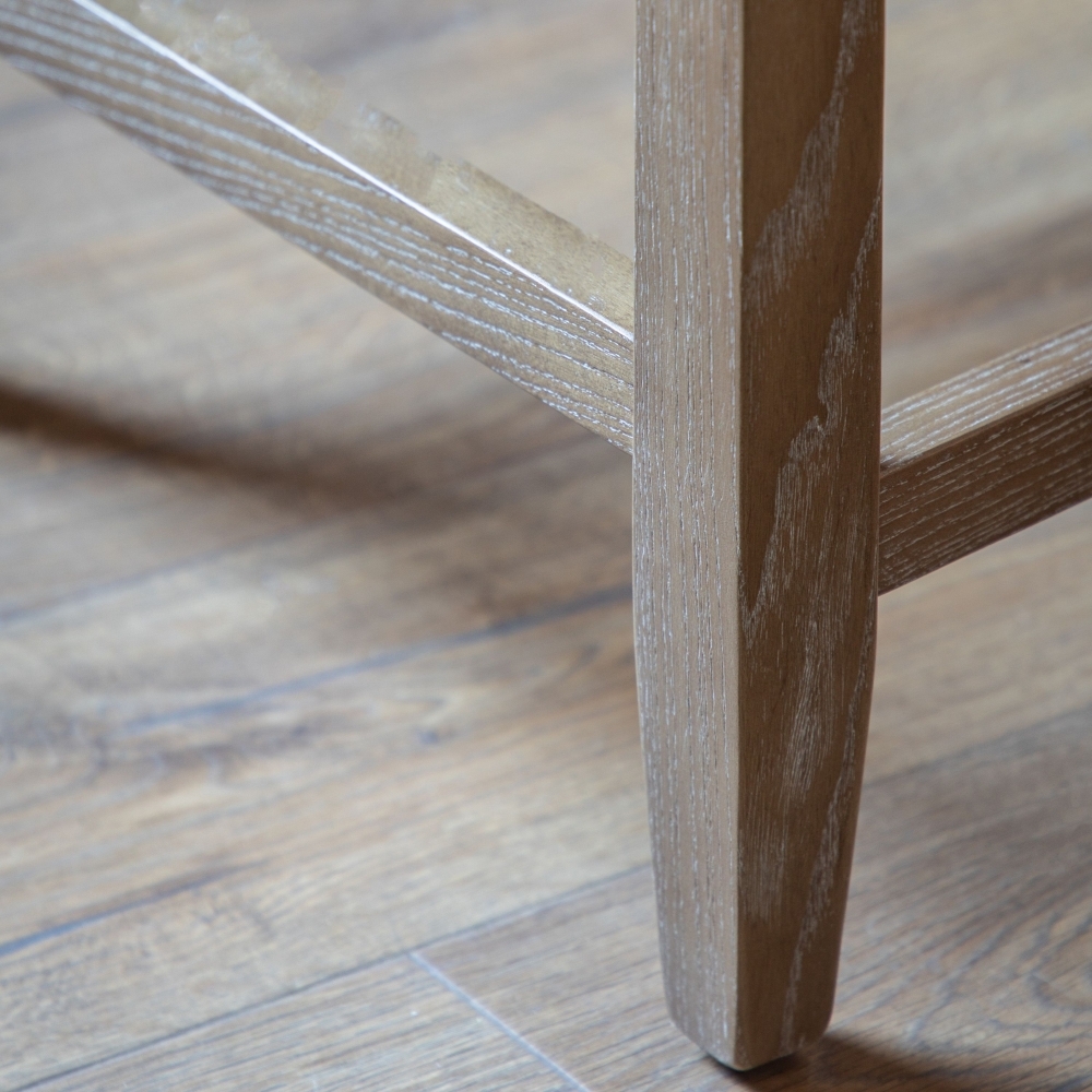Product photograph of Tarnby Barstool Sold In Pairs - Comes In Brown Leather And Grey Linen Options from Choice Furniture Superstore.
