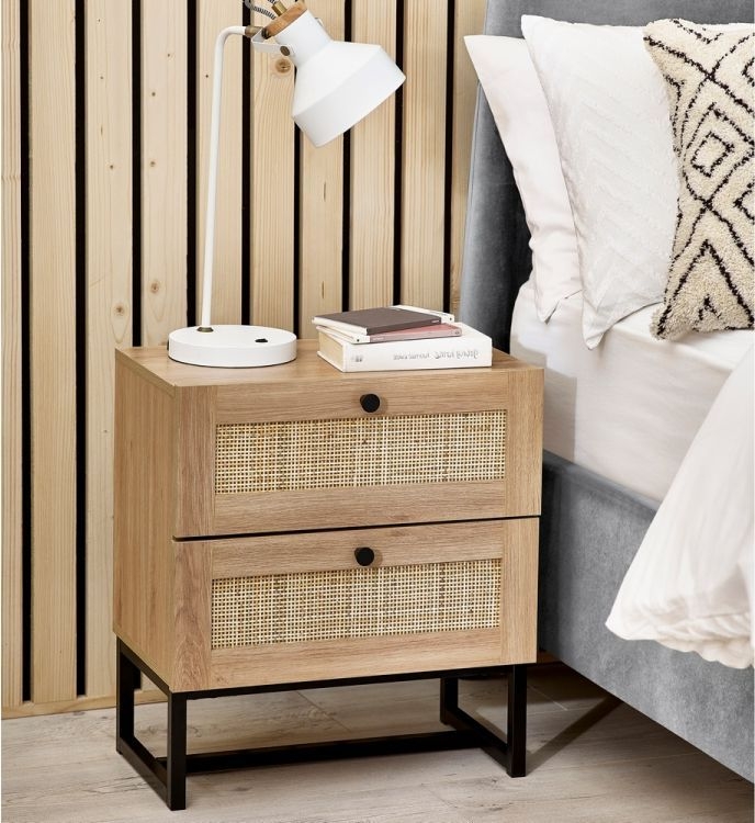 Product photograph of Padstow Wood Effect Rattan 2 Drawer Bedside Cabinet - Comes In Oak And Black Options from Choice Furniture Superstore.