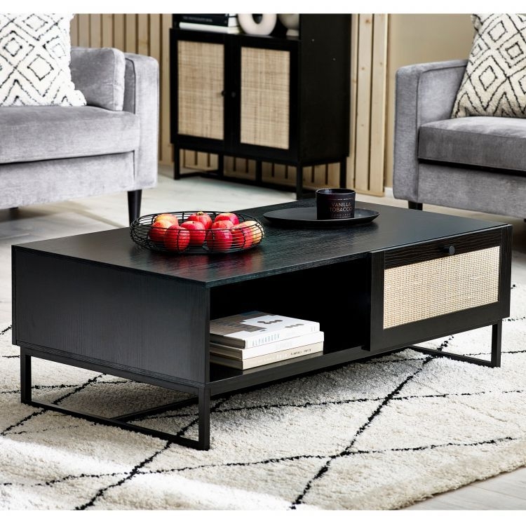 Product photograph of Padstow Black And Rattan 120cm Coffee Table from Choice Furniture Superstore.