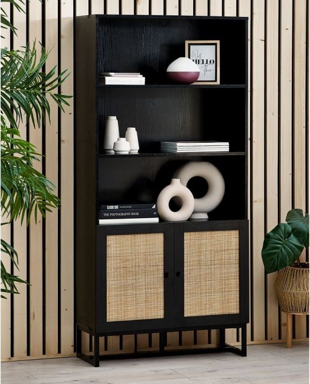 Product photograph of Padstow Black And Rattan Bookcase from Choice Furniture Superstore.