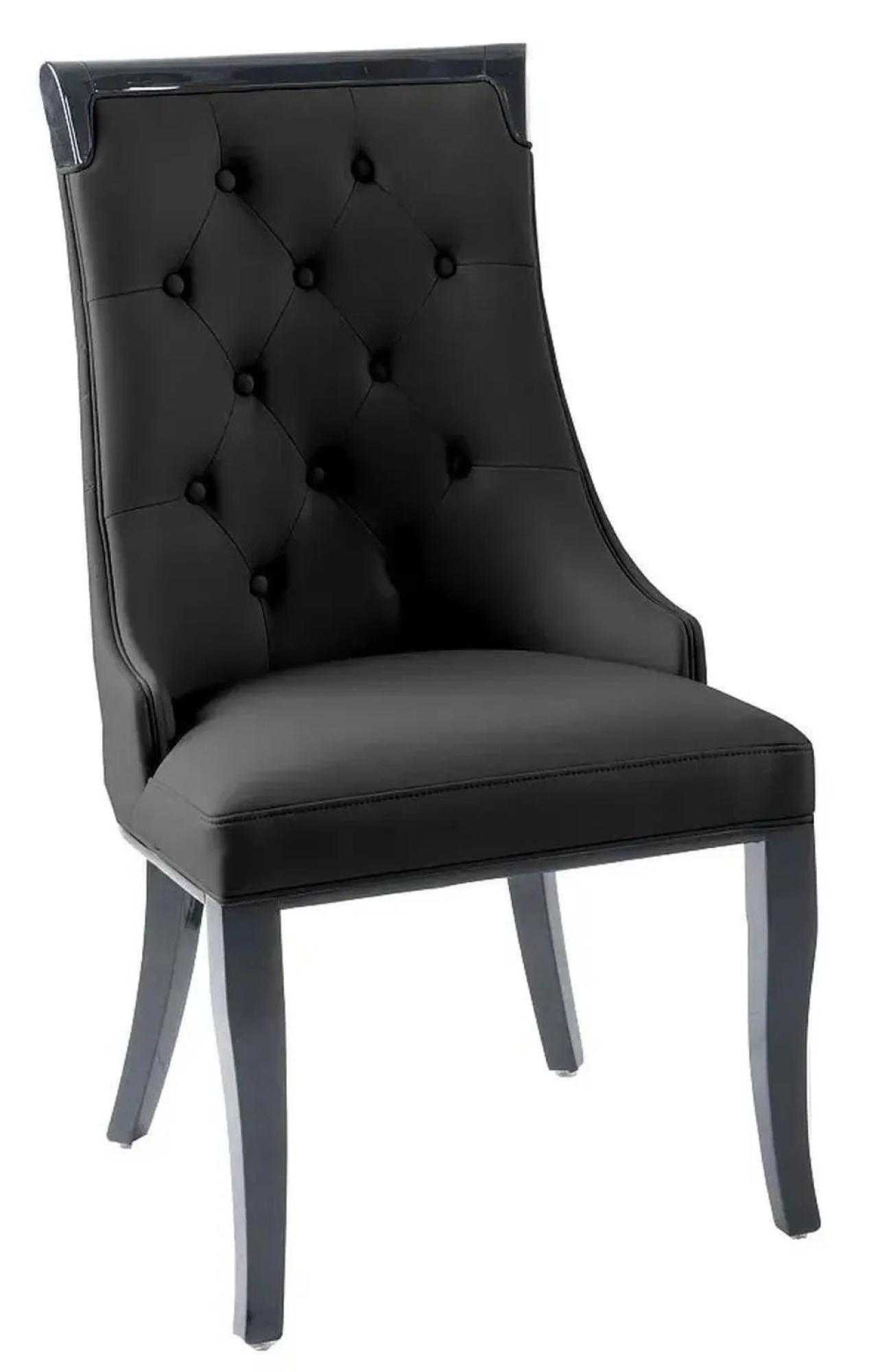 Product photograph of Carmela Black Leather Large High Back Dining Chair With Black Legs from Choice Furniture Superstore.