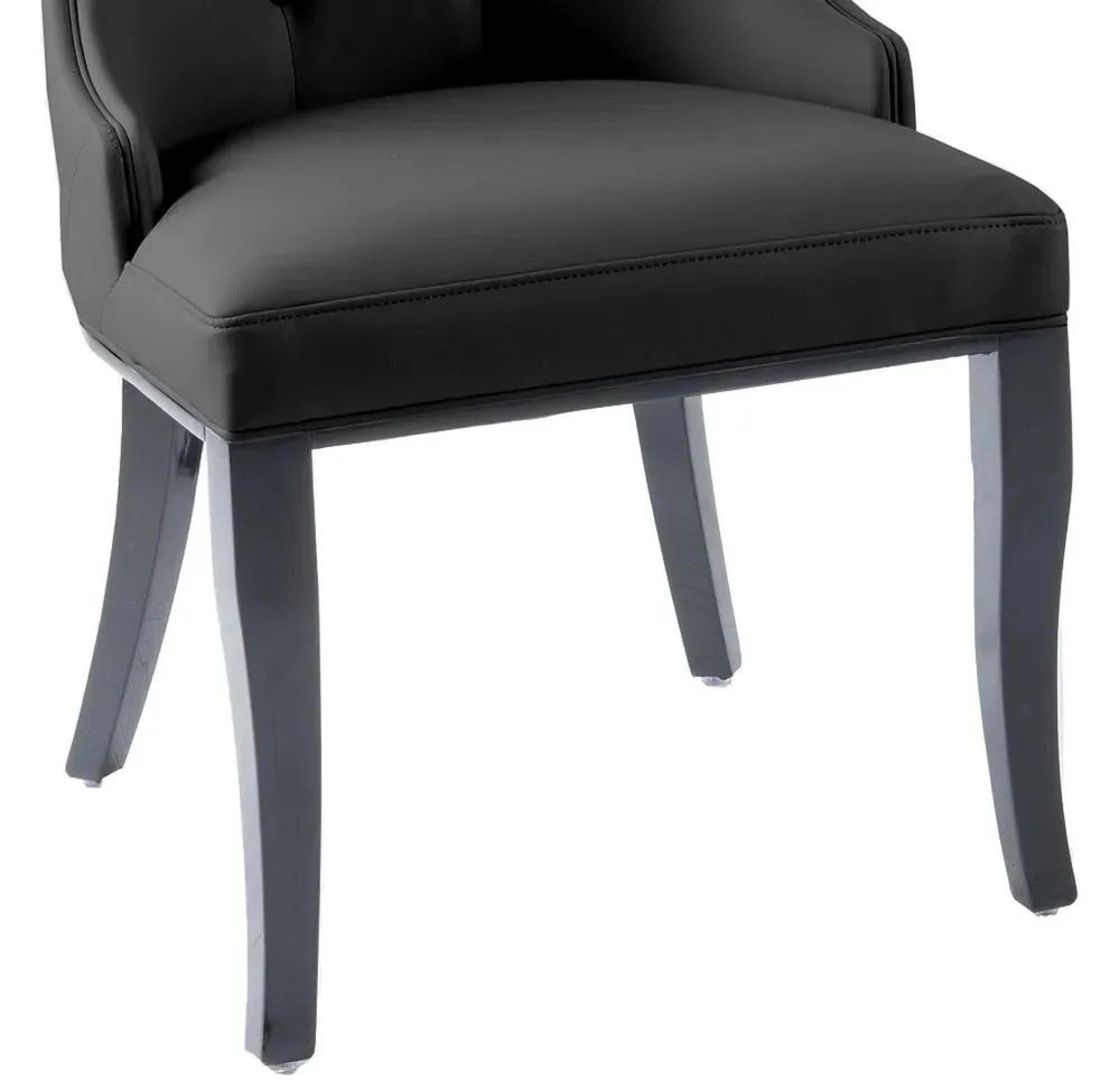 Product photograph of Carmela Black Leather Large High Back Dining Chair With Black Legs from Choice Furniture Superstore.