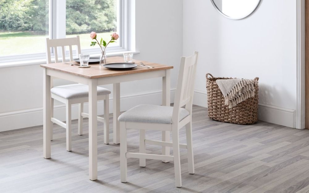 Product photograph of Coxmoor Ivory Painted 2 Seater Dining Set With 2 Chairs from Choice Furniture Superstore.