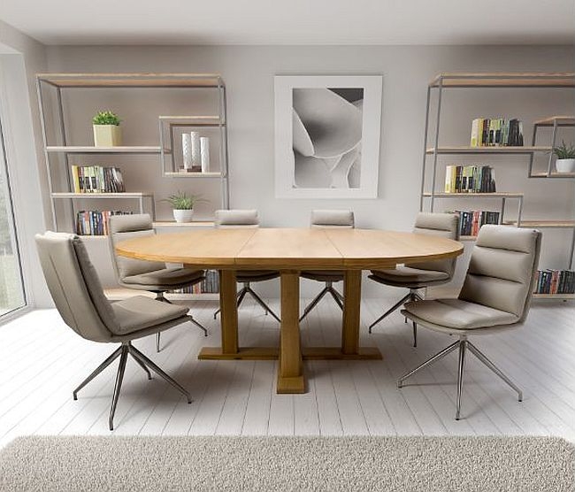 Product photograph of Madrid Oak 160cm-210cm Extending Round Dining Table from Choice Furniture Superstore.
