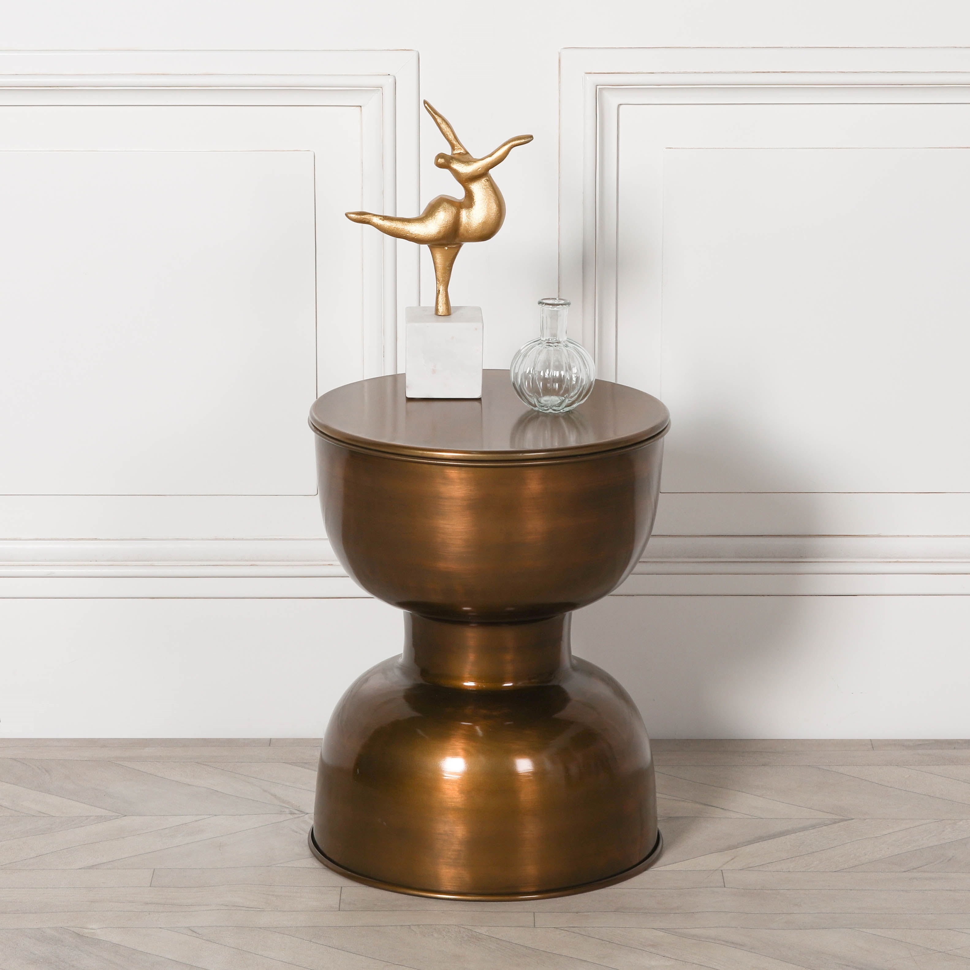 Product photograph of Antique Brass Hour Glass Round Side Table from Choice Furniture Superstore.