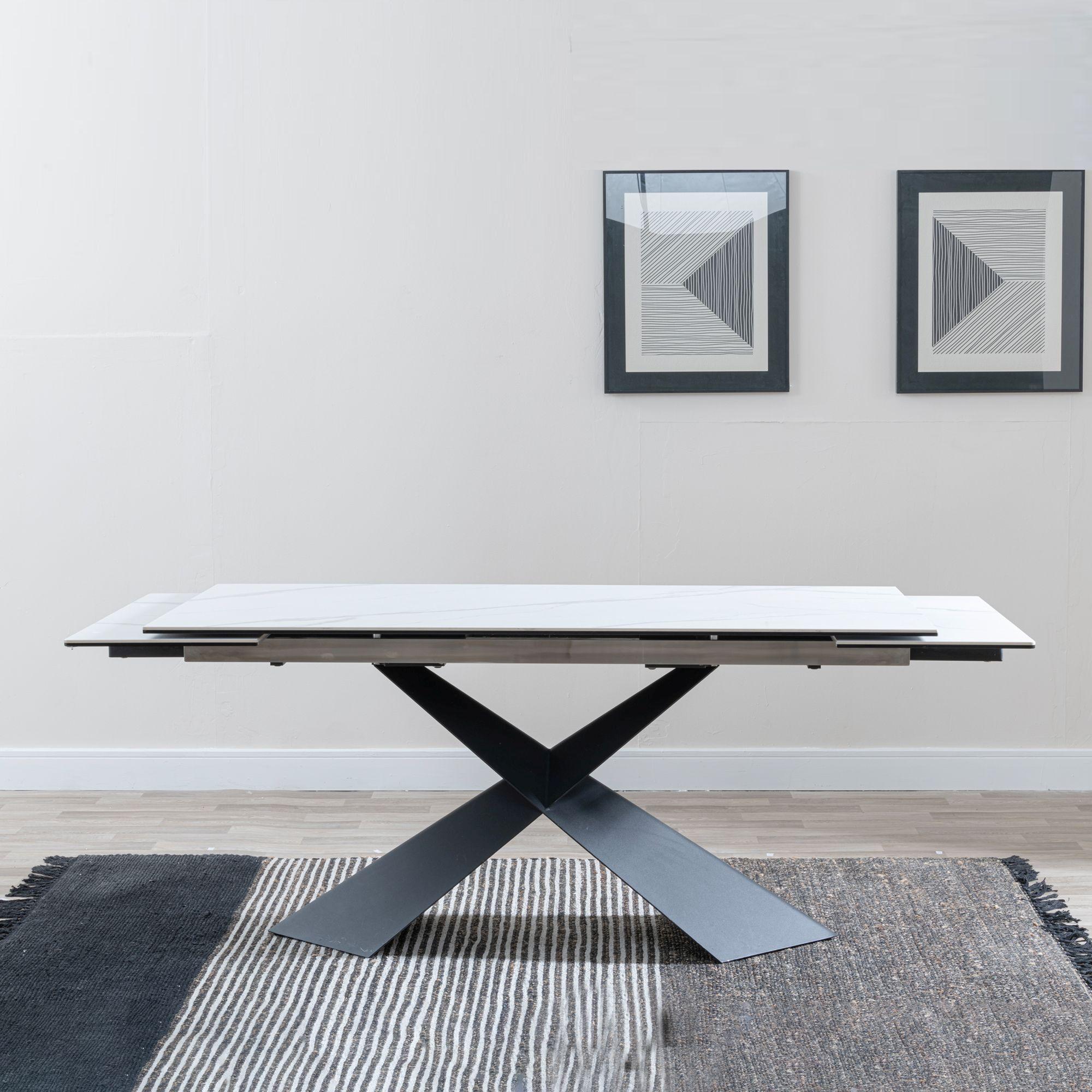 Product photograph of Hayden White Ceramic Extending Dining Table With Black Cross Base from Choice Furniture Superstore.