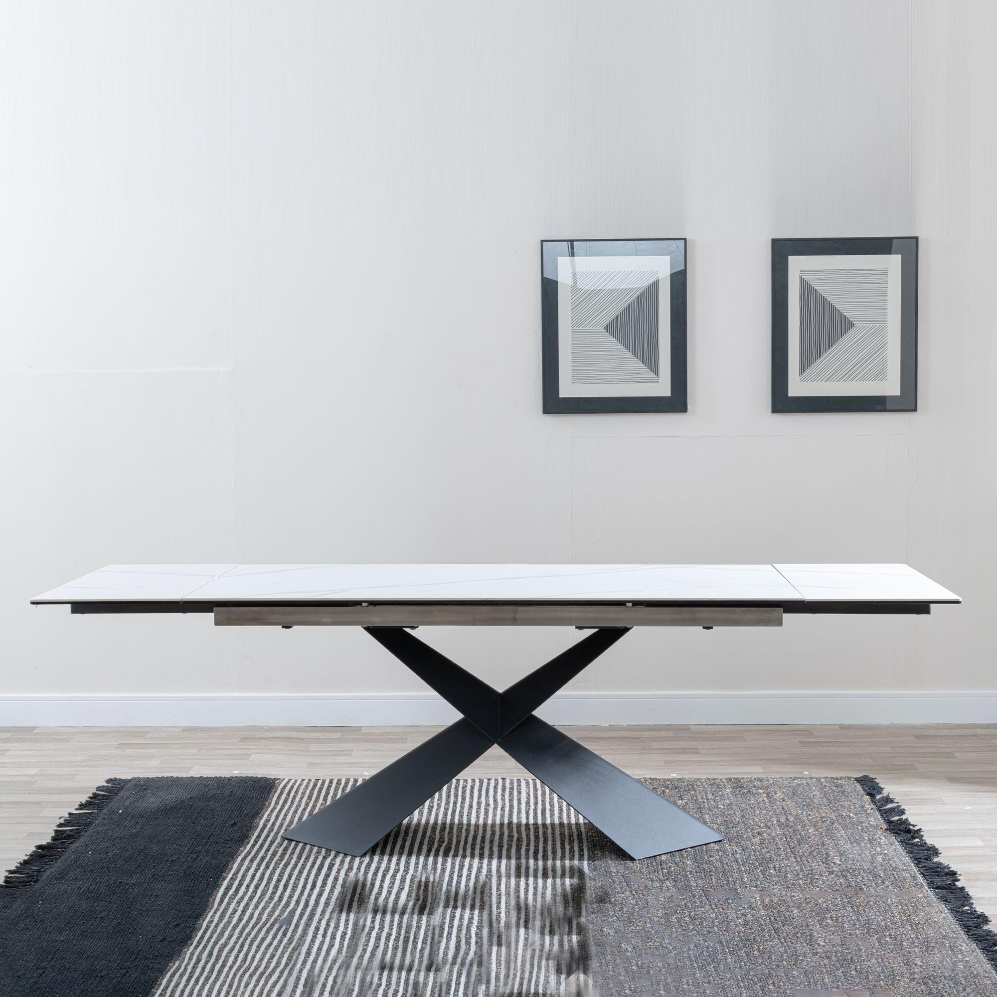 Product photograph of Hayden White Ceramic Extending Dining Table With Black Cross Base from Choice Furniture Superstore.