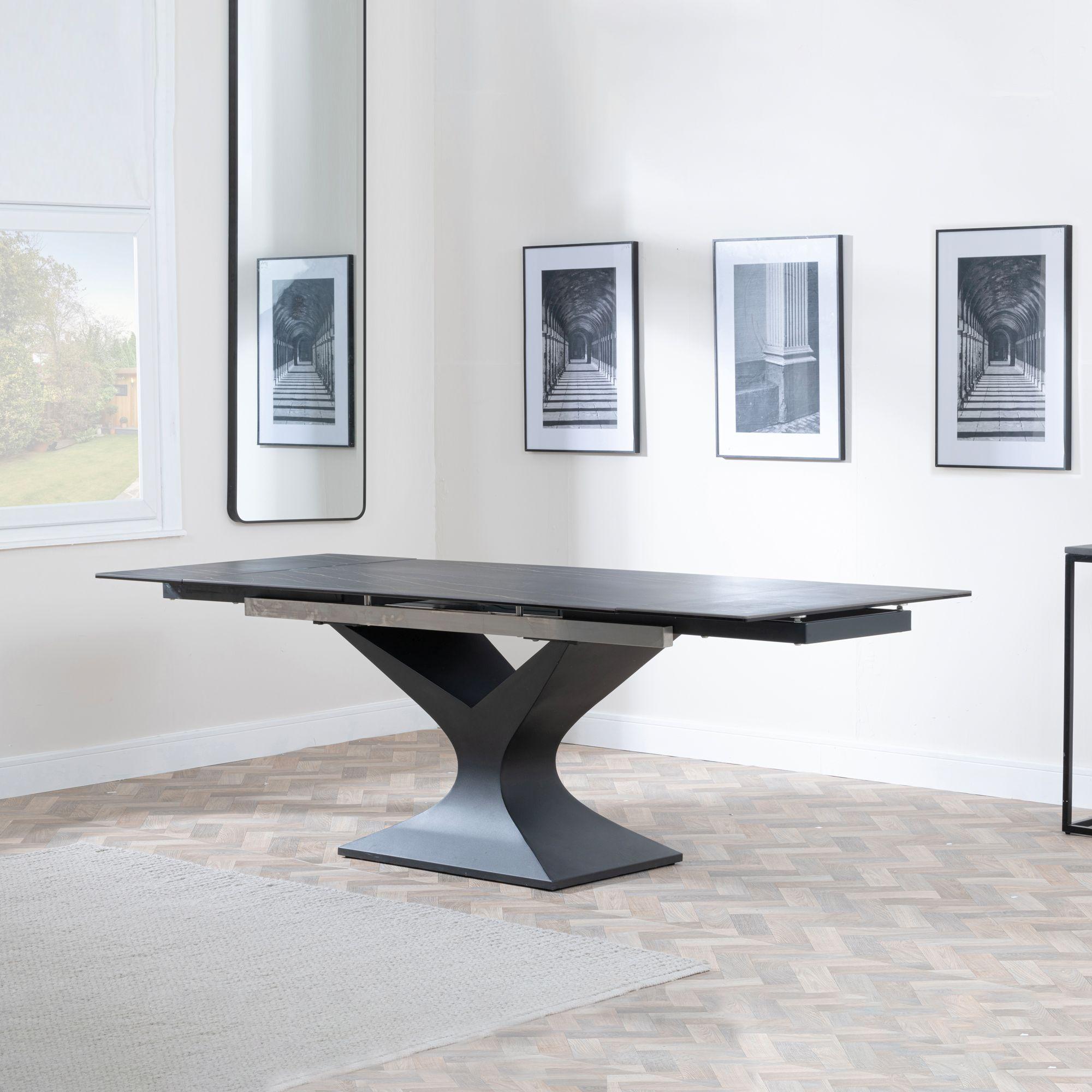 Product photograph of Anvik Black Ceramic Extending Dining Table With Black Pedastal Base from Choice Furniture Superstore.