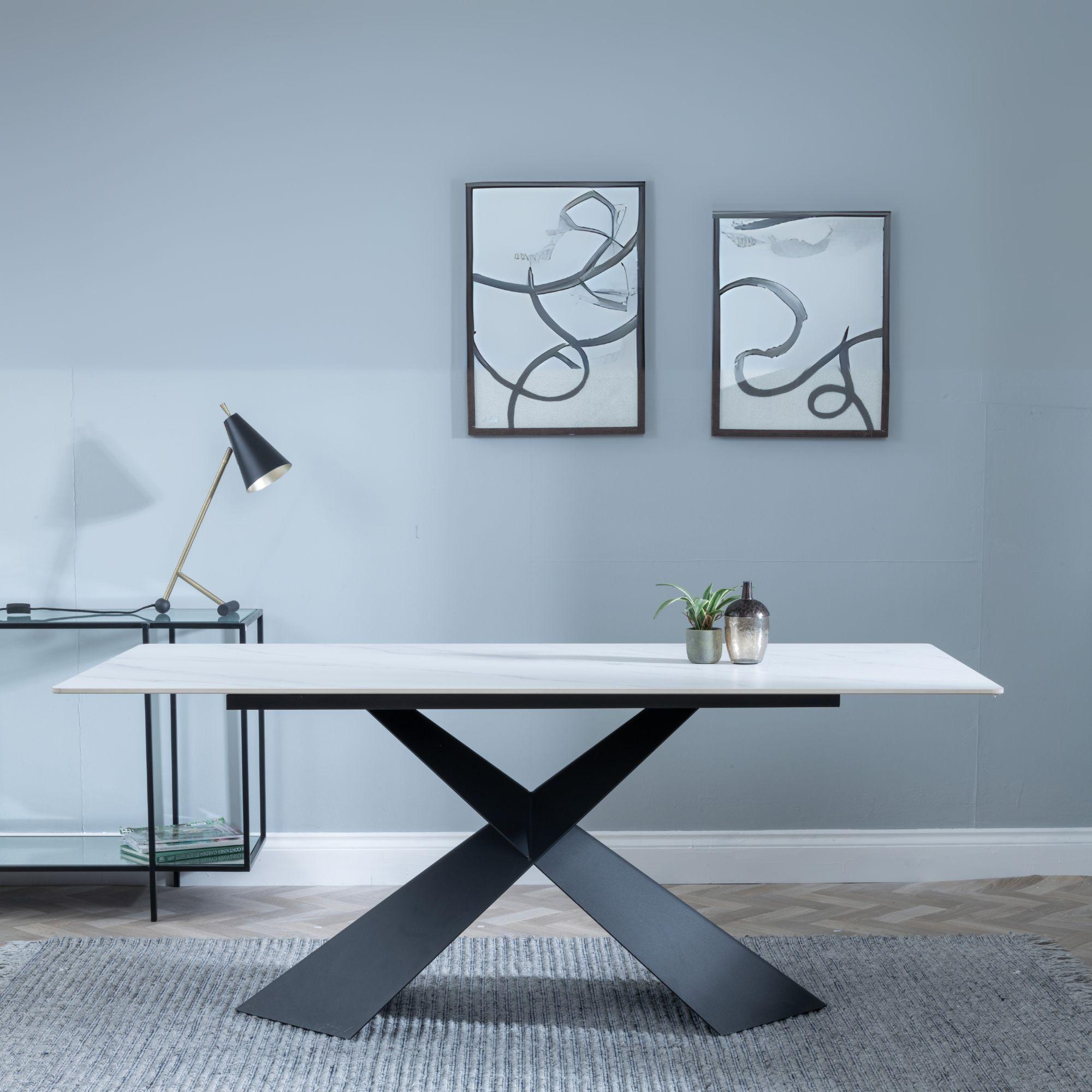 Product photograph of Merlin 180cm White Ceramic Dining Table With Black Cross Base from Choice Furniture Superstore.